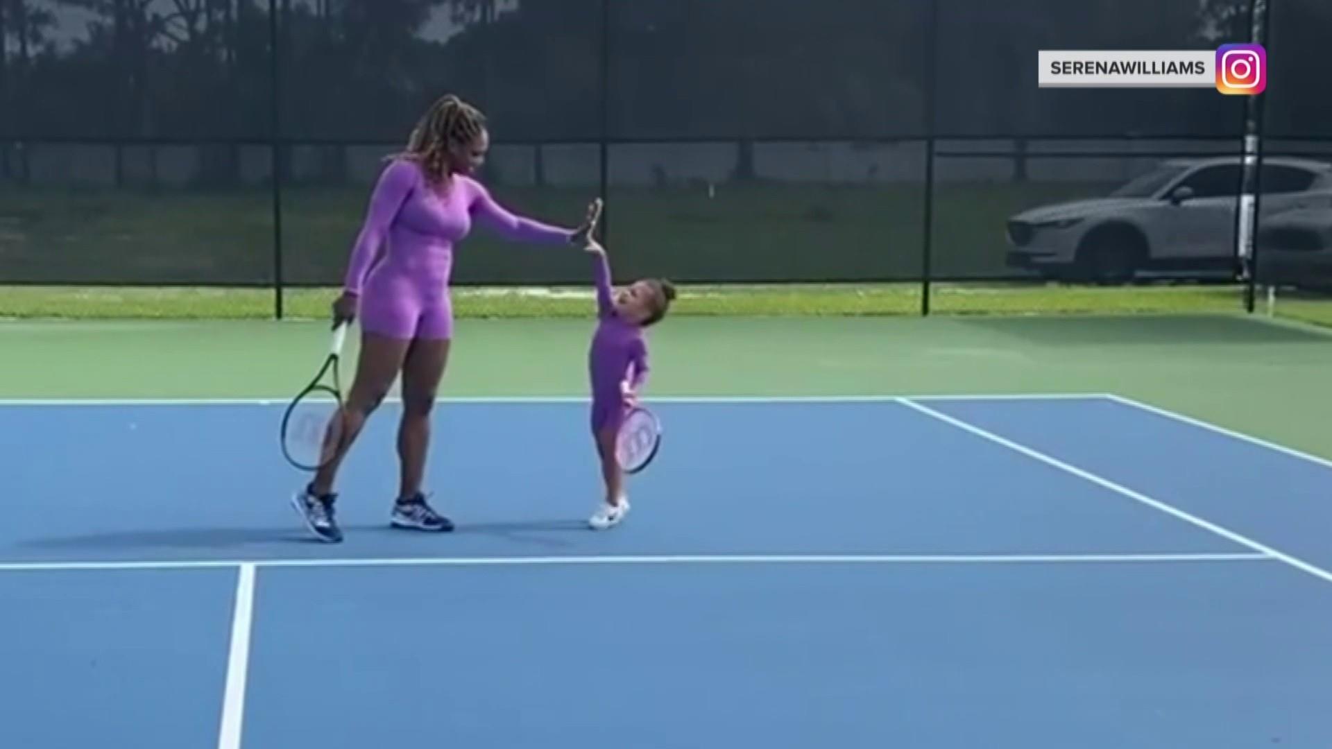 Williams' 2-year-old daughter tennis court with her mom