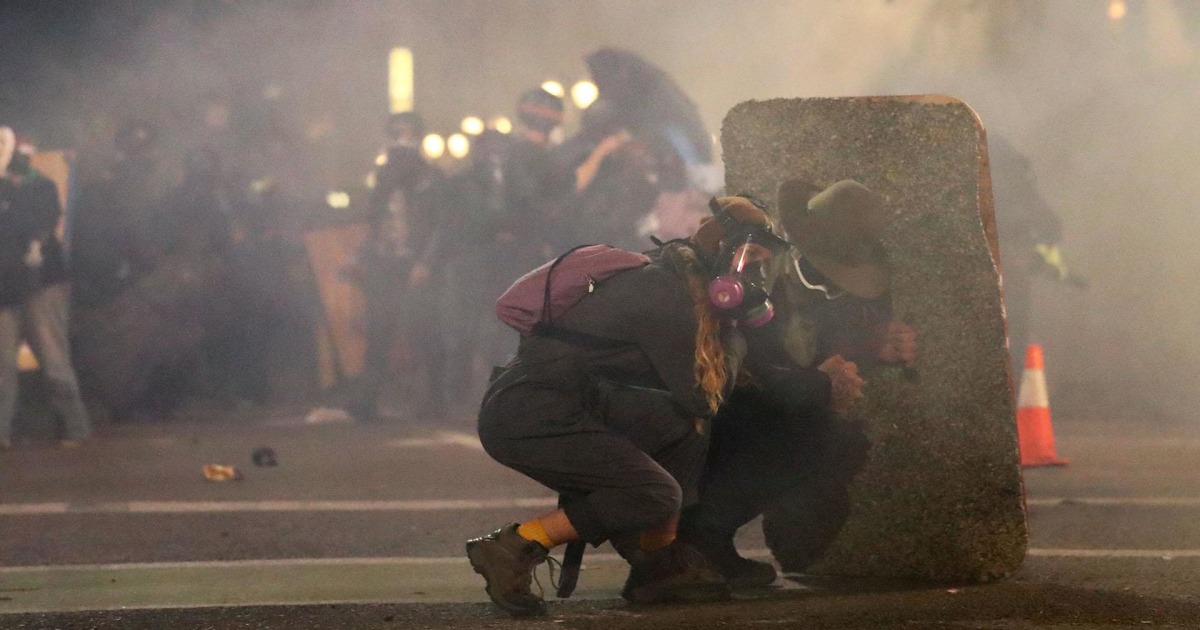 Tear gas, flash-bangs and fireworks thrown on another violent night in Portland thumbnail
